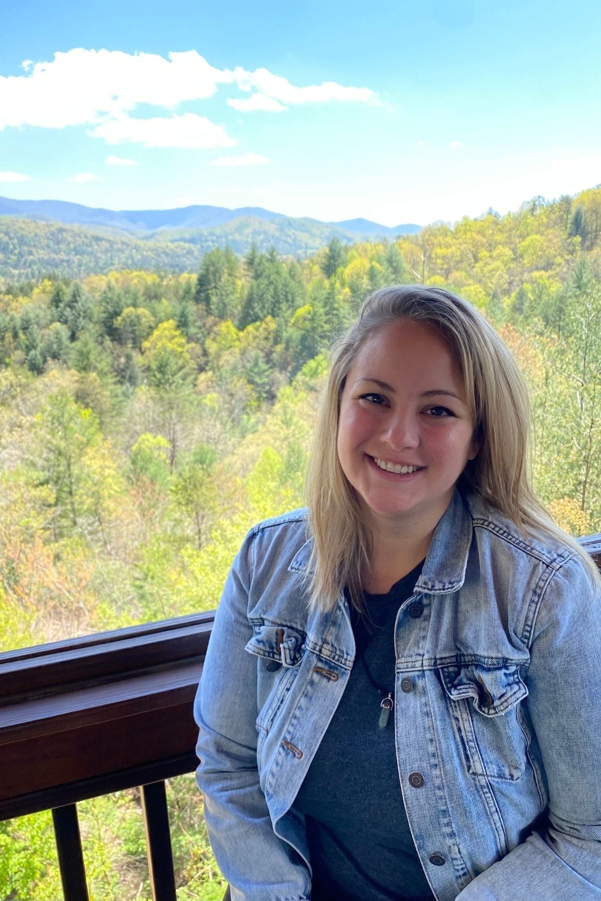 portrait of woman sitting on cabin neck in Blue Ridge Georgia