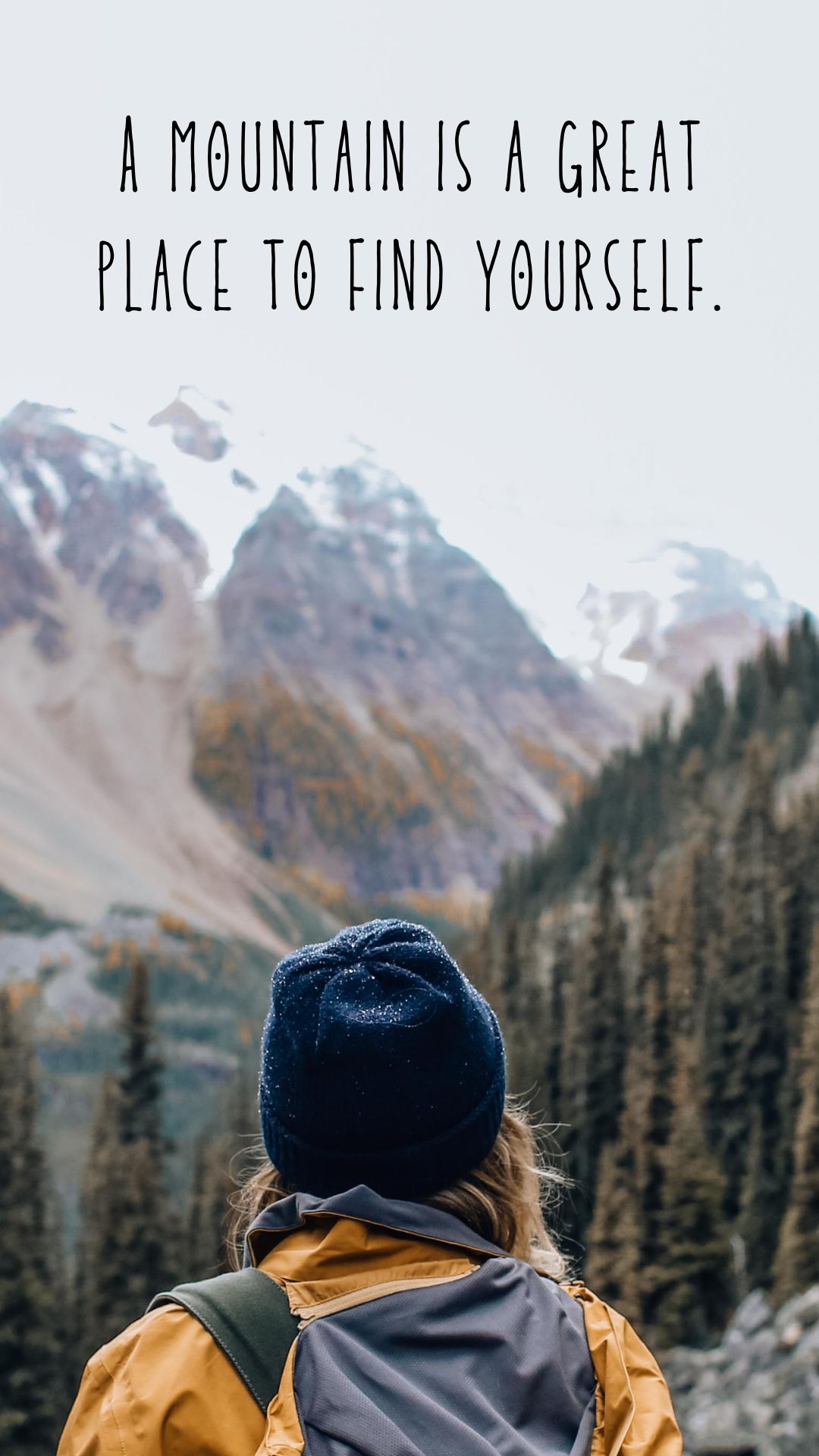 young woman hiking on a mountain trail